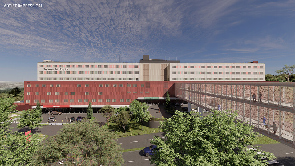 Aerial artist impression of the new Toowoomba Hospital with a pedestrian bridge and surrounding landscaping.
